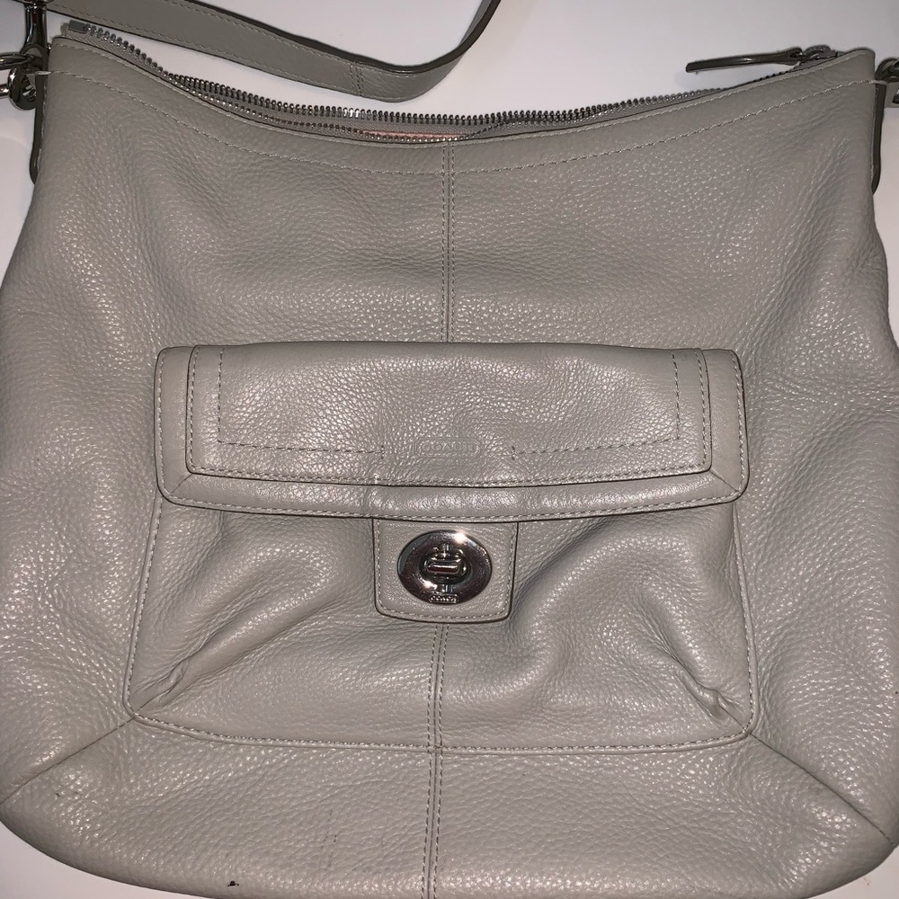 Grey coach purse with pink lining